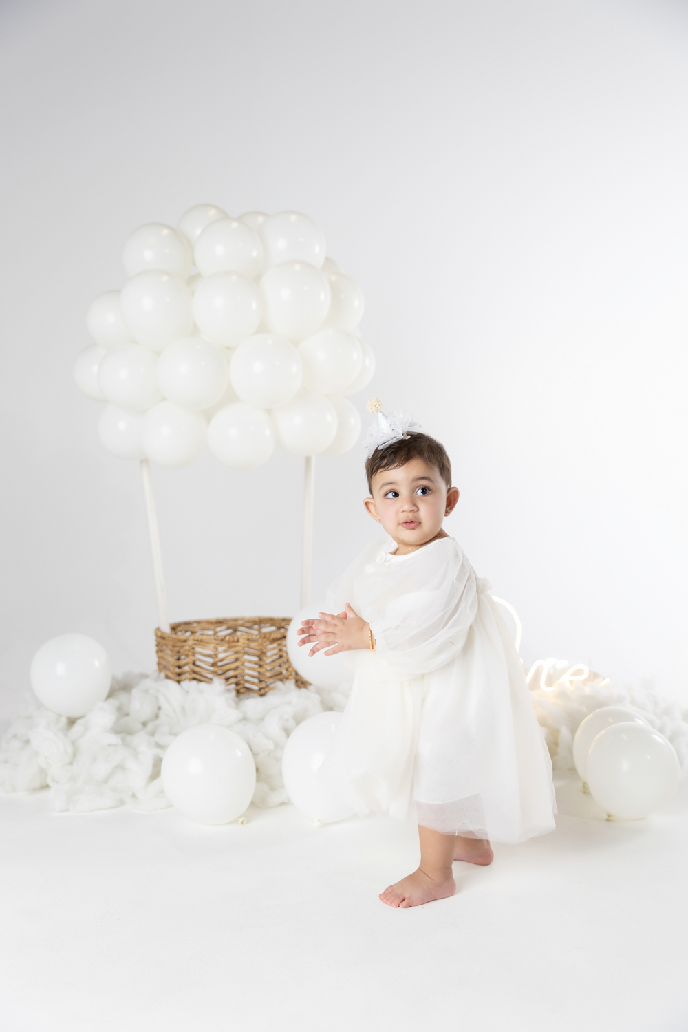Baby boy and balloons