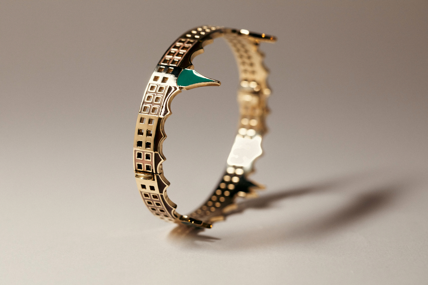 gold bracelet crown side view